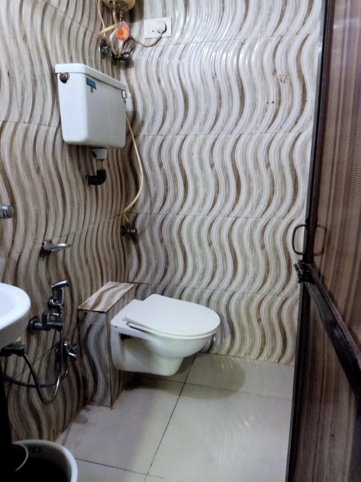 Hotel Central Inn Мумбаї Номер фото