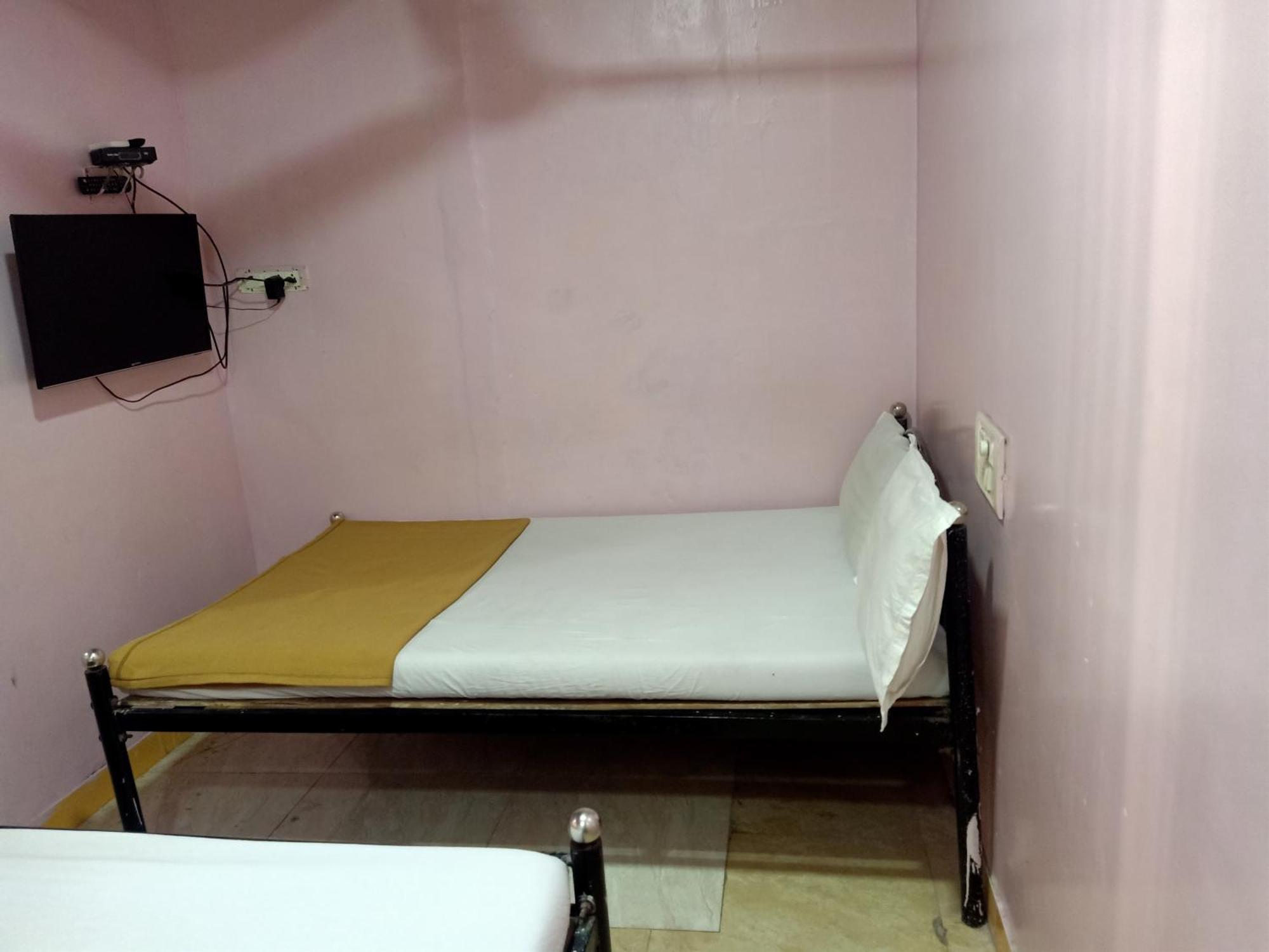 Hotel Central Inn Мумбаї Номер фото